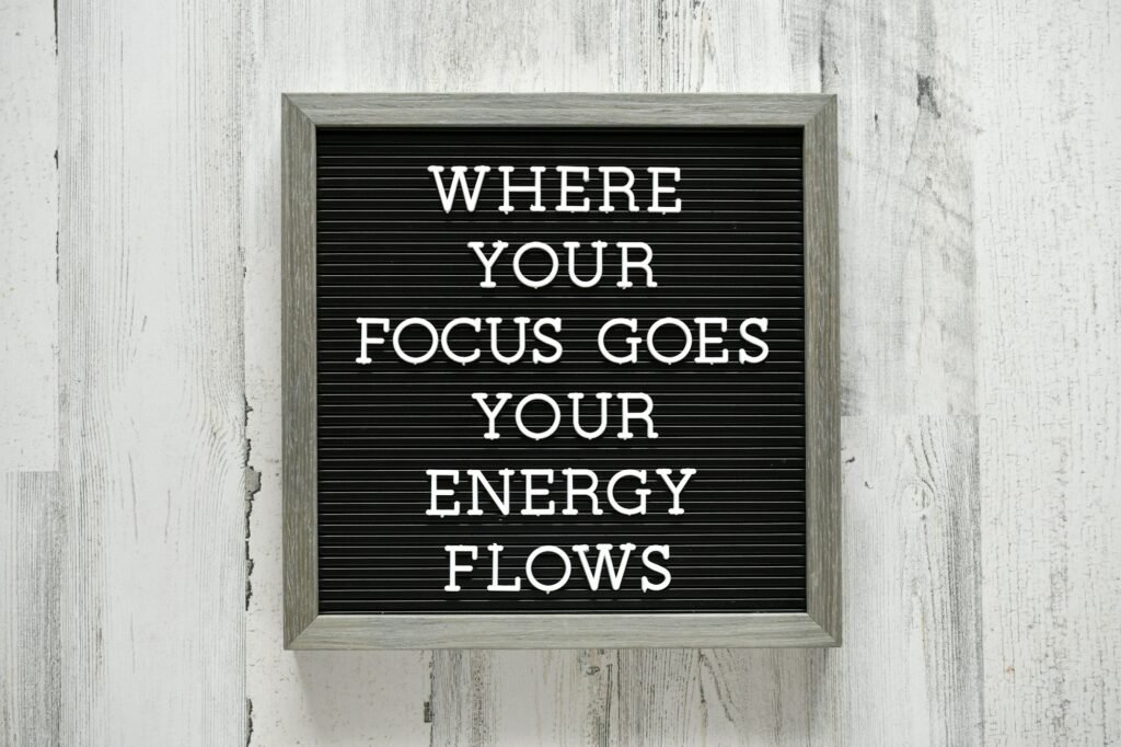 Message letter board with the saying or quote - Where your focus goes, your energy flows